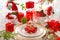 Christmas table decoration with red candles