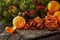 Christmas table and decorations, fruits, nuts, tangerines, dried oranges