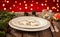 Christmas table - elegant white plate with cookies, red background