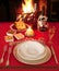 Christmas table near the fireplace