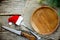 Christmas table place setting empty wooden plate cutlery on wood