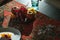 Christmas table setting. Still life with fresh fruits, sunlight and harsh shadows