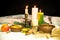 Christmas table with traditional food and candles on black background. Authentic east european dishes on the festive table.