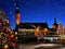 Christmas Tallinn Old  Town Hall Square Winter night marketplace and  tree light decoration ,  holiday celebration in Europe  blur