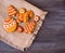 Christmas tasty cookies lie on a napkin on a wooden background
