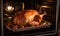 Christmas or Thanksgiving festive turkey cooking in an oven