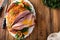 Christmas or Thanksgiving spiral sliced ham with oranges and herbs