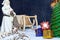 Christmas theme. Santa Claus in Christmas atmosphere with gifts, Christmas tree and snow. Christmas - An extraordinary Christian h