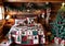 Christmas-Themed Patchwork Quilts In A Rustic Cabin Setting. Generative AI