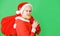 Christmas time. Santa Claus with present bag. New year gift. Delivery gifts. Shopping. Copy space.