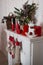 Christmas toys, garlands and interior elements in lights, home decoration for the holiday.