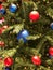 Christmas traditional pine tree decorations with balls and toys, New Year celebration preparation.