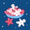 Christmas traditional plate with gingerbread men and cookies stars on a classic blue background with snowflakes in hand