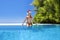 Christmas travel beach holidays in Maldives. Christmas Maldives beach and Santa Claus woman. Bikini girl wearing santa hat