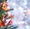 Christmas tree background and Christmas decorations with snow, blurred, sparking, glowing. Happy New Year and Xmas