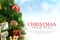 Christmas tree background with a red ornament gift box berries a