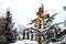 Christmas tree branch with decorations on the background of the Orthodox cross with a crucifix. The Orthodox Church. Winter is Chr