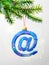 Christmas tree branch with decorative email symbol