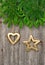 Christmas tree branch with golden ornaments decoration