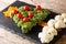 Christmas tree of broccoli, cauliflower, tomato, pepper closeup