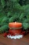 Christmas tree and Christmas burning candle.Rustic style.