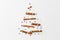 Christmas tree of cinnamon sticks and sprinkles