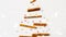 Christmas tree of cinnamon sticks and sprinkles