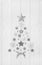 Christmas tree of a collection with white, silver and grey stars