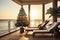 A Christmas tree is decorated on the balcony of a hotel with sun beds by the sea on vacation in a tropical country with palm trees