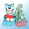 Christmas tree decorated with balls and ribbons. Year of Blue Tiger. Gift in hands of baby. Children`s photo frame. Cute baby