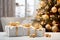 Christmas tree decorated with golden and silver ornament balls and garland. Wrapped gift boxes. Cozy homely festive atmosphere.