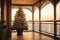 A Christmas tree is decorated on the hotel by the sea view on vacation in a tropical country with palm trees at sunset. Travel for