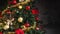 Christmas tree decorated luminous gold,red flower night,symbol Religion text zoom