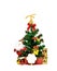 Christmas tree decorated with ribbon, card, fork and spoon in golden gift box, Santa Claus and ball on white background with copy