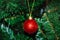 Christmas tree decoration. Balls, stars garland on a tree. Red bows on a New Year tree. The festive tree is decorated with bright