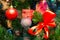 Christmas tree decoration. Balls, stars garland on a tree. Red bows on a New Year tree. The festive tree is decorated with bright