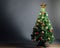 Christmas tree with decoration, grey background