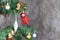 Christmas tree decorations against cement wall background