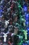 Christmas tree with decorations balls angels garlands lamps. Holiday Christmas atmosphere