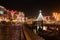 Christmas tree and decorations near the Ria de Aveiro with Moliceiro boats at night