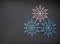 Christmas tree decorations three snowflakes on grey background winter holiday