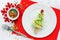 Christmas tree dessert - portion cheesecake on stick with colorful sugar sprinkles shaped christmas tree