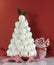 Christmas tree dessert treat made with pink and white meringues