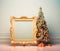 Christmas tree with empty painting frame with presents and decoration.