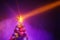 Christmas tree with festive lights, purple background with smoke