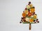 Christmas tree of food on a white background. Ingredients: cranberry, rosemary, orange, apple, lime, cinnamon and anise. Top view