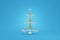 Christmas tree fragile gold wire decoration hanging ball crystal glass. Graceful toy concept design blue background. Elegant