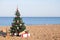 Christmas tree with the gift of tropical resort on the beach