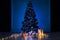 Christmas tree with gifts lights garlands New Year December