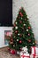 Christmas tree with gifts for new year bedroom holiday winter